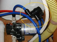 water filter 
            fitted to inlet plumbing (80 kB)
